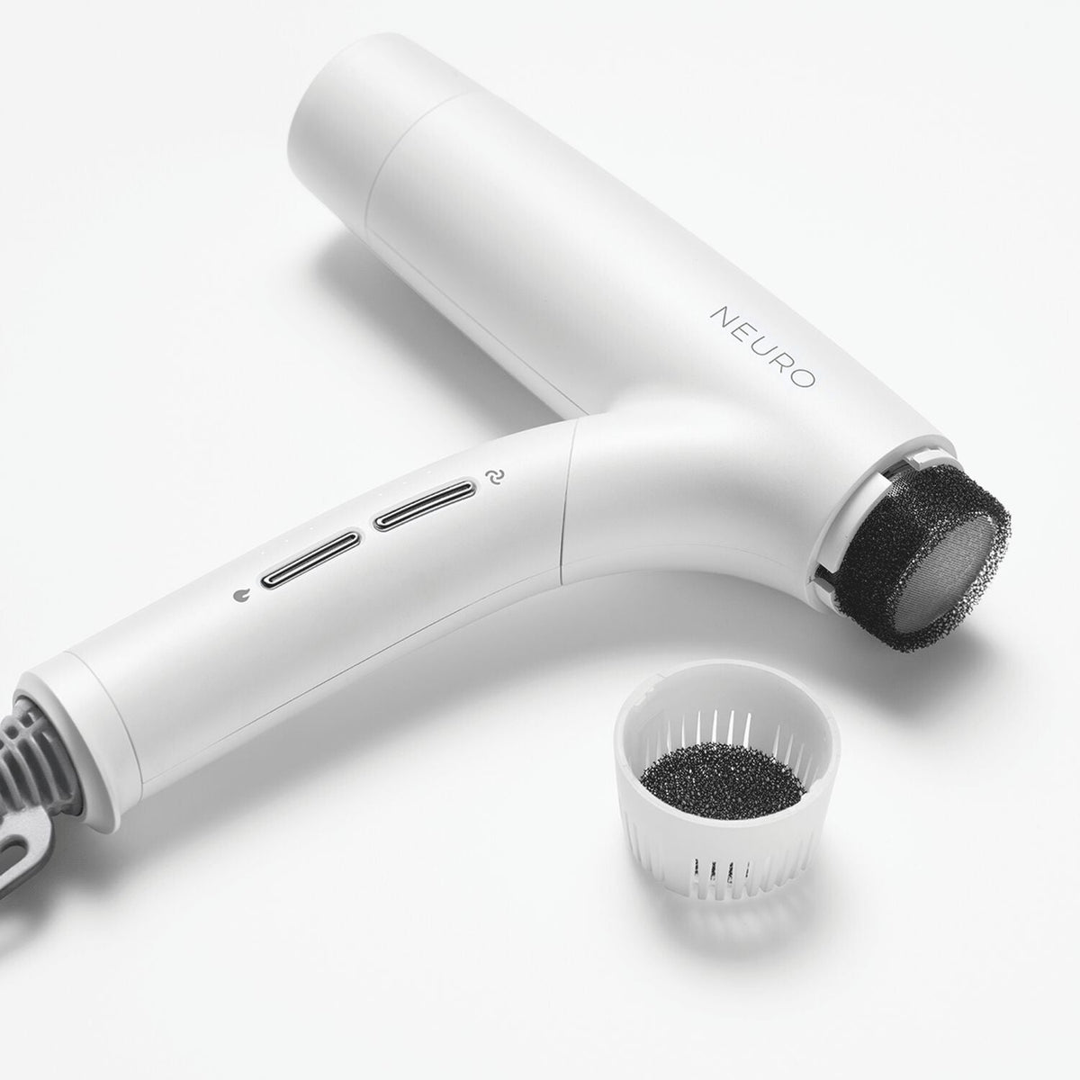 Pearlescent White Paul Mitchell Neuro Dry+ hair dryer with removable filter components