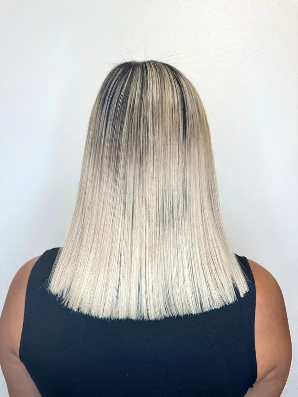 Manufacturer-provided Keratin Tropic after example showing smoother blonde hair